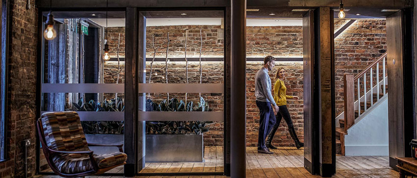 People walking through a corridor